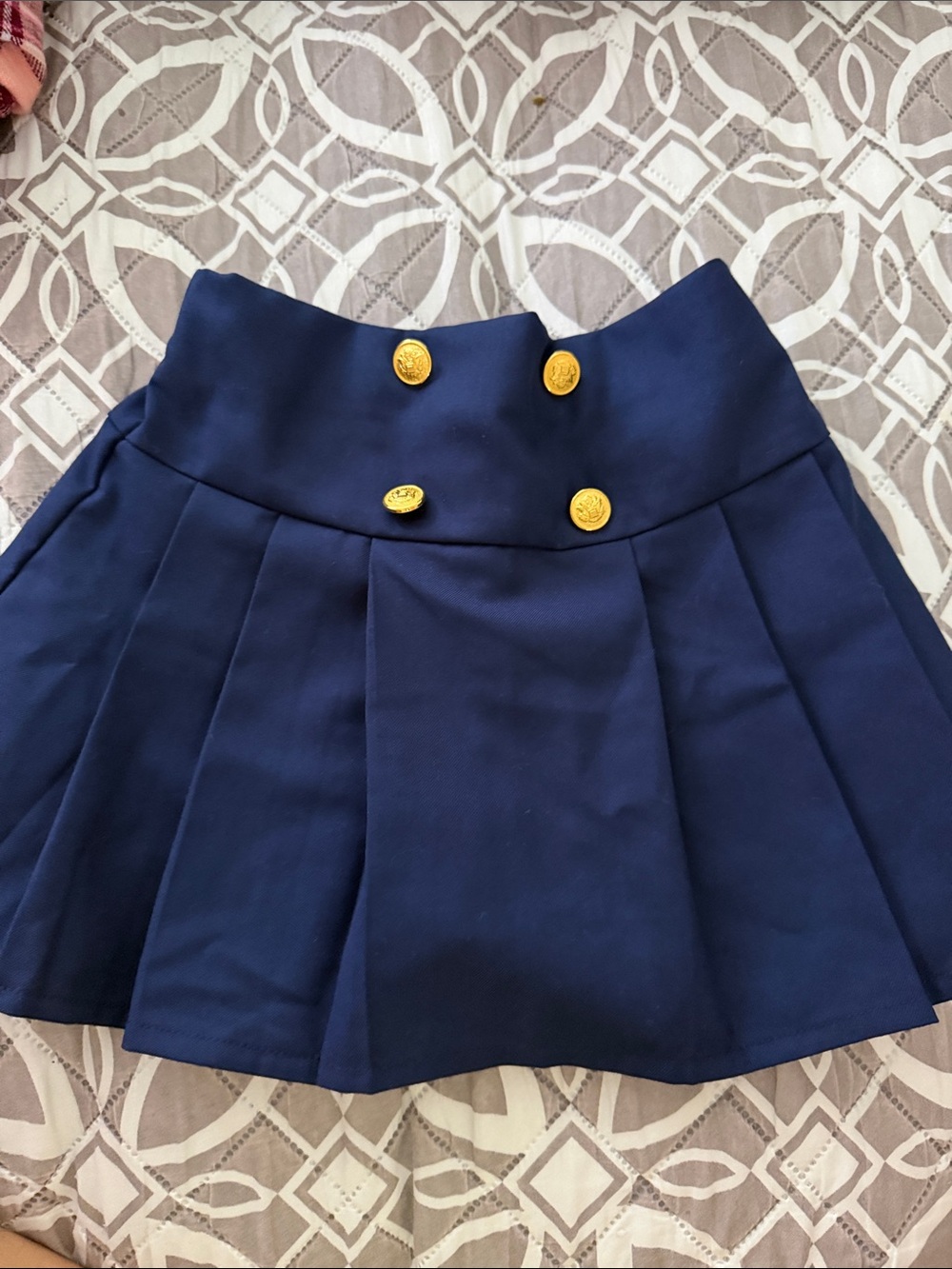 Classic Navy Pleated Skirt with Gold Buttons